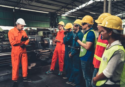 Technicians training to use asphalt maintenance machinery by BearCat MFG