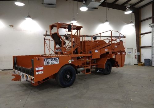 Chip Spreaders in Illinois in a warehouse, ready to be delivered to local asphalt contractors