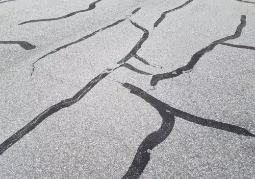 Timely attention to asphalt cracks is important. BearCat Manufacturing sells the best crack sealers in Nevada.